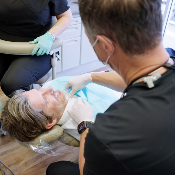Patient undergoing dental treatment at Leon Spring Dental Clinic